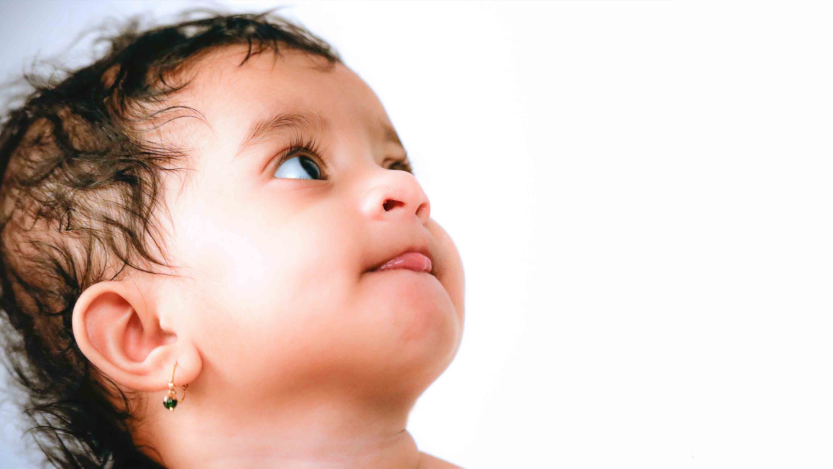 Smiling baby in a beautifully  photoshoot.