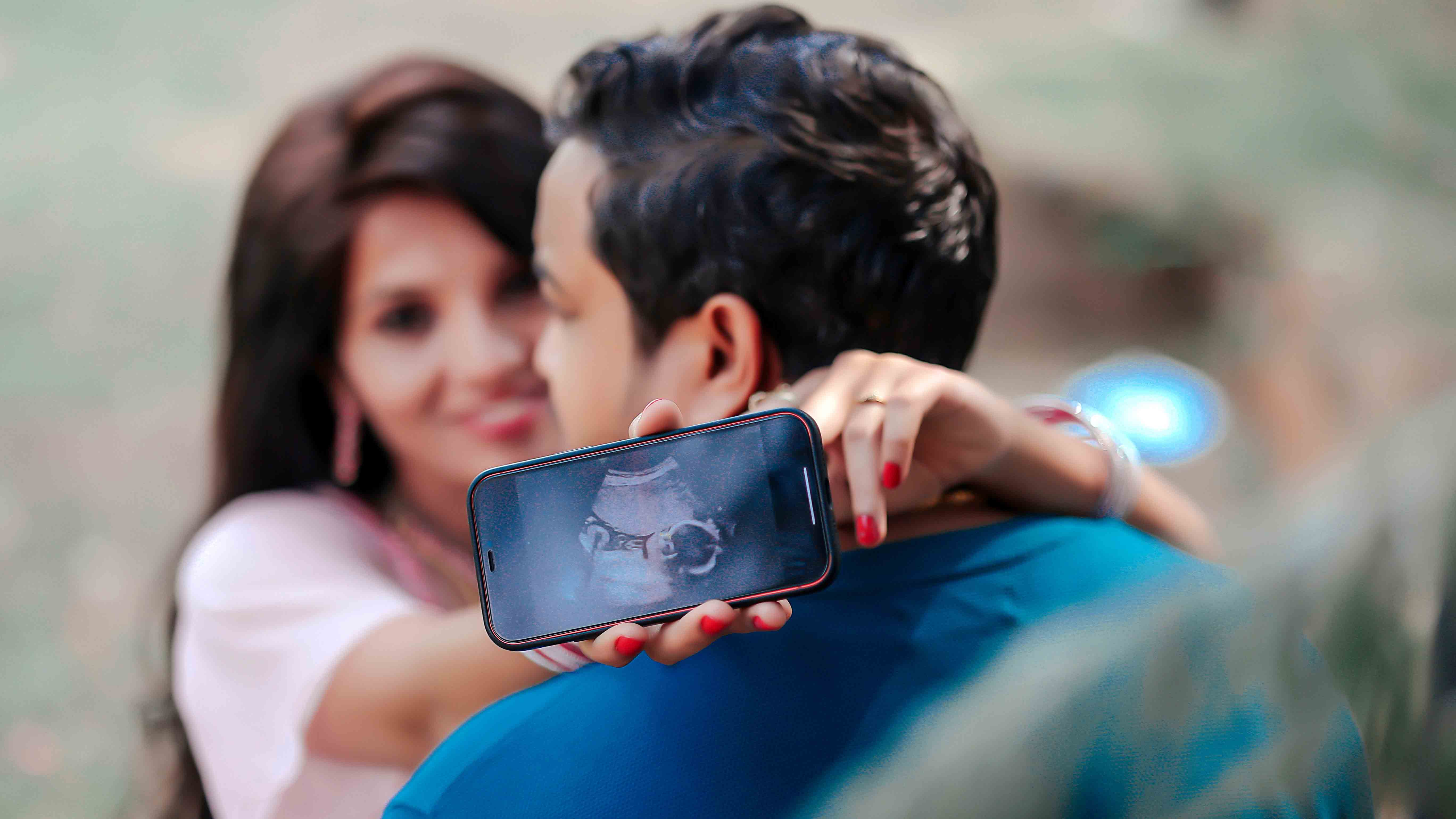 Elegant maternity photo capturing glowing mom-to-be